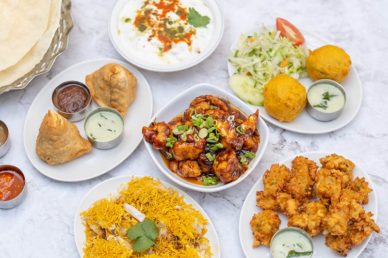 a table with South Indian vegetarian dishes